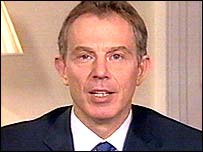 Should Mr. Blair wear the lampshade on his head?